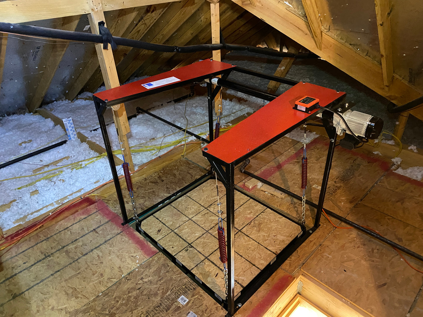Attic Lift Wireless Remote on its lift