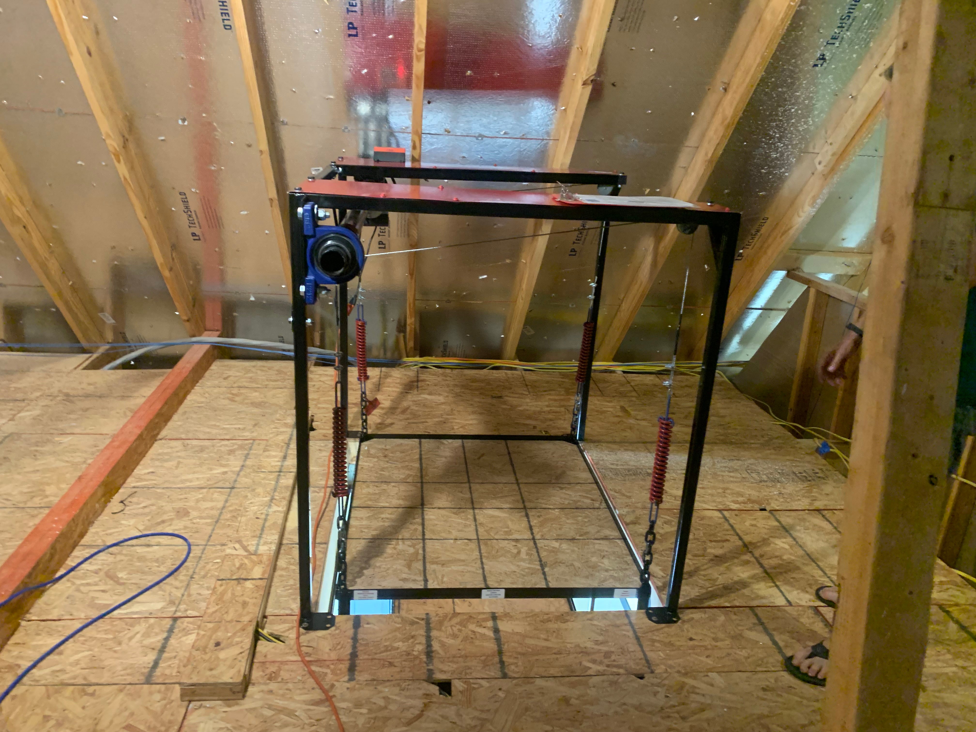 Attic Lift - 300XL lbs. Steel Frame 42" x 48" installed on Attic